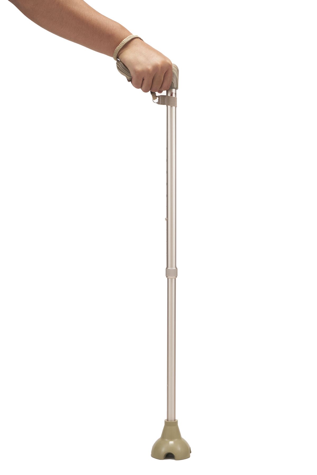 The cane stands on its own with the elastic quad base