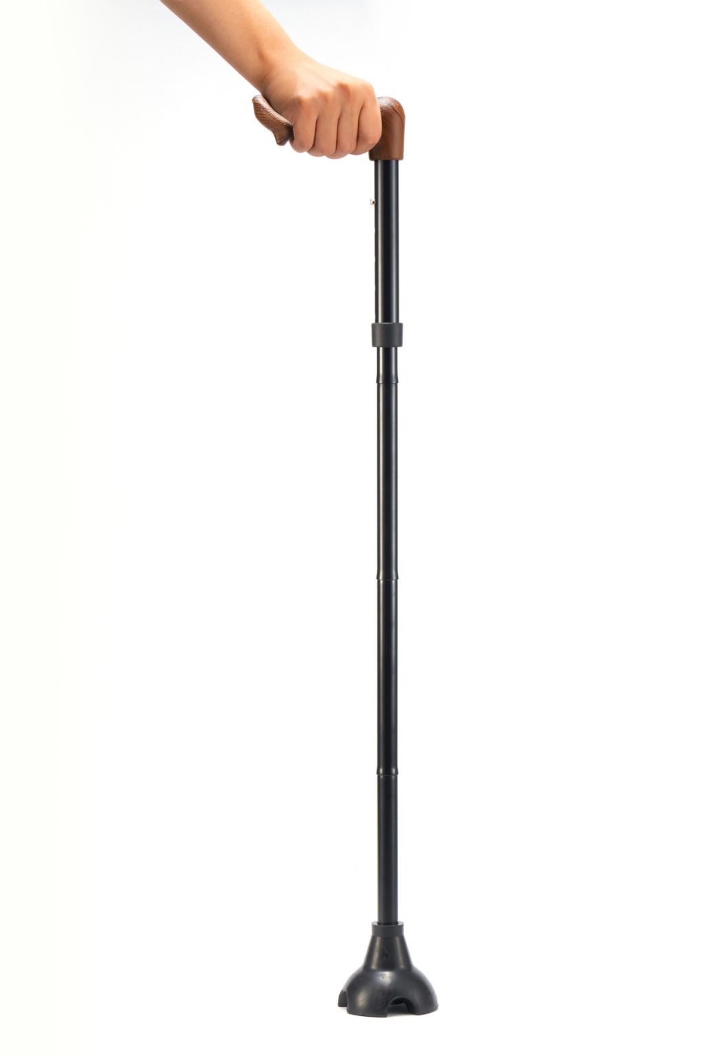 The cane stands on its own with the elastic quad base